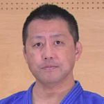 IPU・環太平洋大学女子柔道部の矢野智彦監督の柔道衣着用の顔写真 2025年
